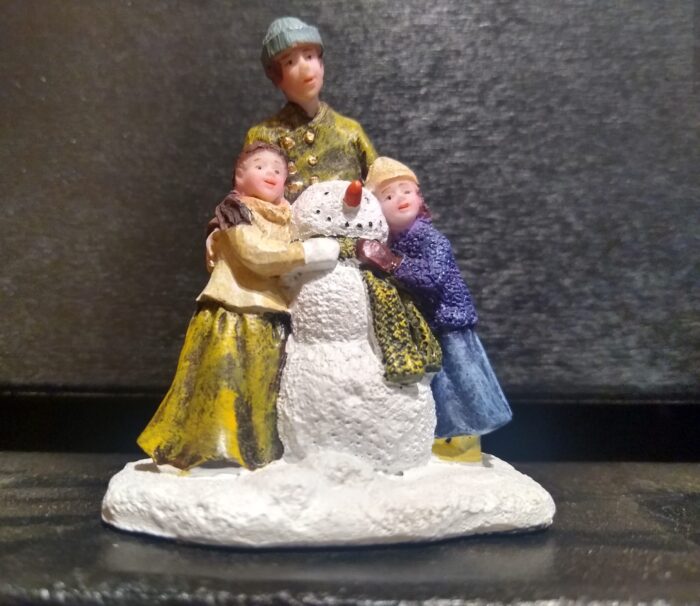 Family made a snowman - Afbeelding 2