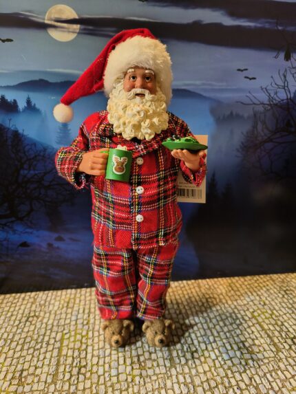 5: Kerstman met geruite pyama