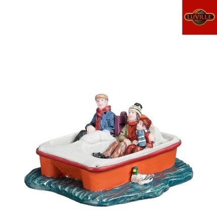 Family on pedal boat