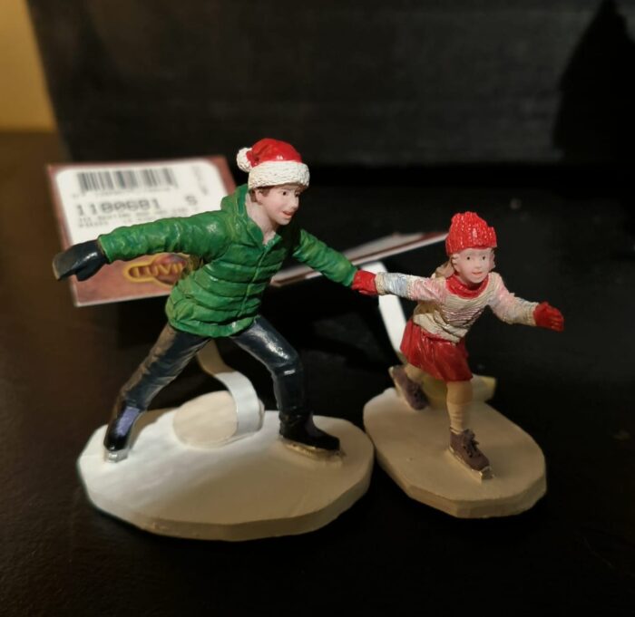 Ice skating man and girl - Afbeelding 2