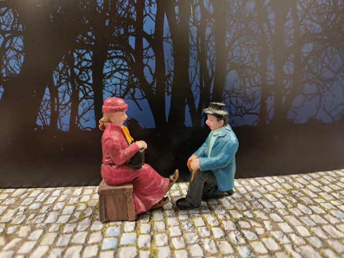 Man bindt schaatsen onder - Afbeelding 3