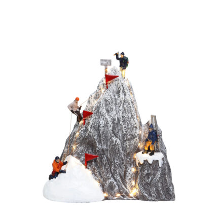 Hikers Climb on Mountaintop