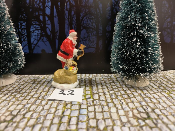 Intratuin Foto 22 Kerstman deelt cadeautjes uit - Afbeelding 2