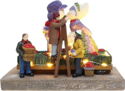 Flower parade with kissing couple