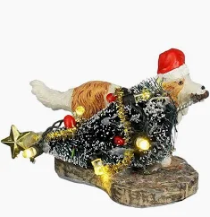 Bad dog stealing christmas tree