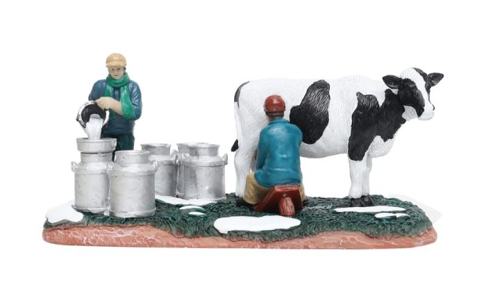 Milkfarmer with cow and pours milk - Afbeelding 1