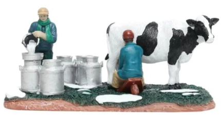 Santaville Milkfarmer With Cow And Pours Milk.*